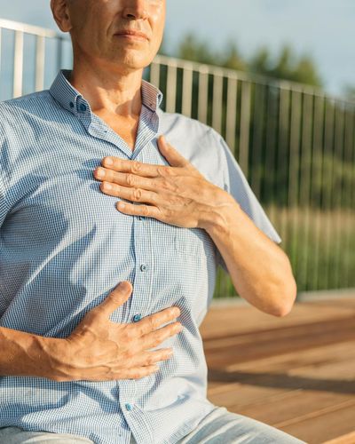 A moment of rest and deep breathing between exercise sets.