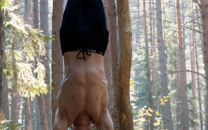 Slow, controlled descent in a bodyweight squat exercise.